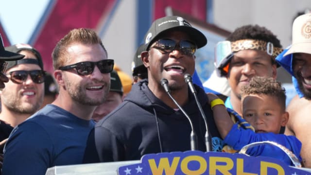Feb 16, 2022; Los Angeles, CA, USA; Los Angeles Rams coach Sean McVay (left) and defensive coordinator Raheem Morris react during Super Bowl LVI championship rally at the Los Angeles Memorial Coliseum.
